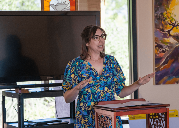 a person standing in front of a tv