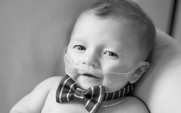 a baby wearing a bow tie