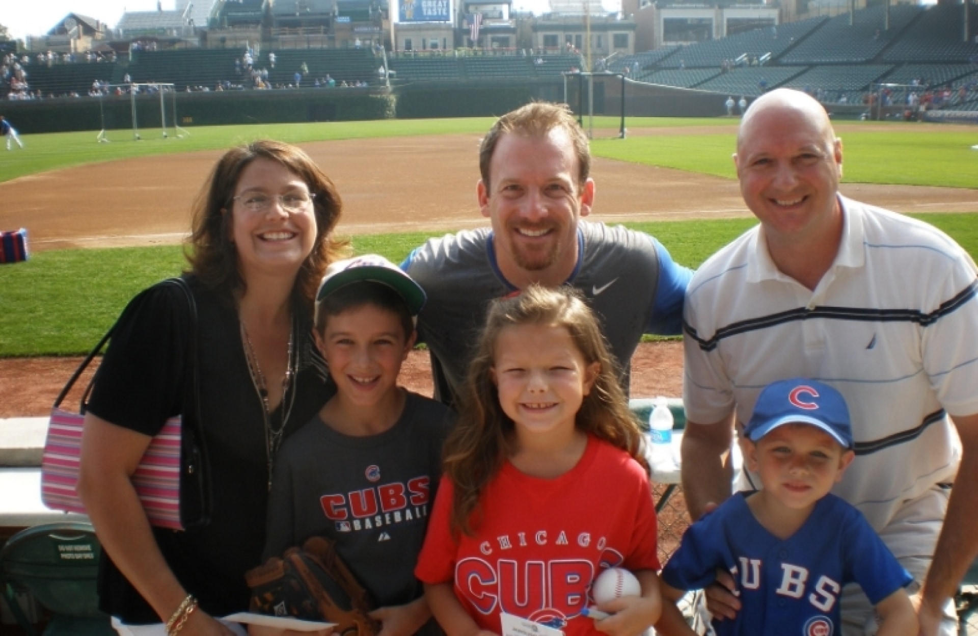 family at a sports field